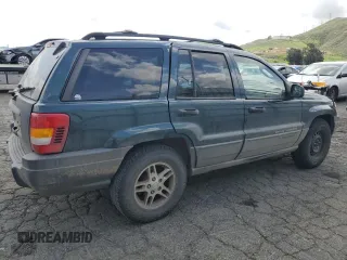 2004 Jeep Grand Cherokee Laredo with VIN 1J4GX48N94C397241, listed as a Copart auction lot 49183315 with 189,099 mi miles and Salvage title. Bid and sale history available at DreamBid. Image 3.