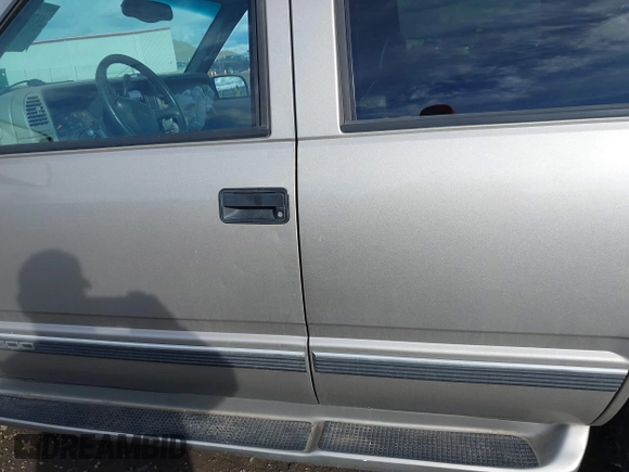 1999 GMC Yukon with VIN 1GKEK13R2XJ712390, listed as a IAAI auction lot 41793649 with 222,721 mi miles. Bid and sale history available at carsss.com. Image 15.