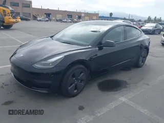 2023 Tesla Model 3 with VIN 5YJ3E1EA5PF647737, listed as a IAAI auction lot 42430145 with 20,525 mi miles and . Bid and sale history available at DreamBid. Image 19.