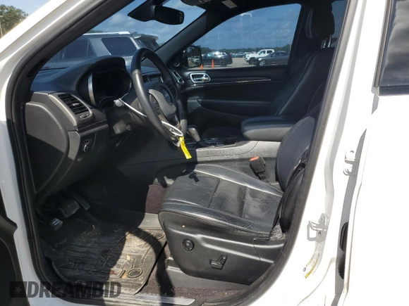 2018 Jeep Grand Cherokee High Altitude with VIN 1C4RJECG1JC260482, listed as a Copart auction lot 57310115 with 144,320 mi miles and Salvage title. Bid and sale history available at DreamBid. Image 7.