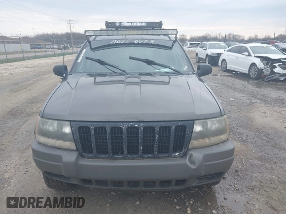 2002 Jeep Grand Cherokee Laredo with VIN 1J4GW48S92C294116, listed as a IAAI auction lot 42080375 with 154,108 mi miles and . Bid and sale history available at DreamBid. Image 6.