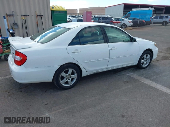 2002 Toyota Camry LE z VIN JTDBE32K020030113, wystawiony jako IAAI lot #41210452 z przebiegiem 190 486 mil mil oraz . Historia ofert i sprzedaży dostępna na DreamBid. Obrazek 4.