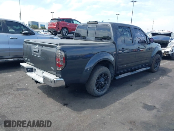 2014 Nissan Frontier SV with VIN 1N6AD0ER8EN756702, listed as a IAAI auction lot 42021294 with 135,143 mi miles and . Bid and sale history available at DreamBid. Image 4.
