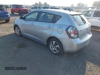 2009 Pontiac Vibe 1SA with VIN 5Y2SP678X9Z473576, listed as a IAAI auction lot 42709951 with 165,434 mi miles and . Bid and sale history available at DreamBid. Image 3.