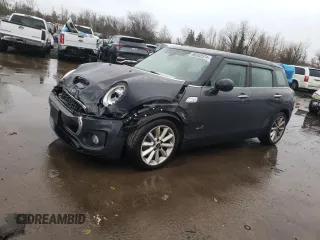 2017 MINI Clubman Cooper S with VIN WMWLU5C52H2E82704, listed as a Copart auction lot 86582974 with 74,136 mi miles and Salvage Title. Bid and sale history available at carsss.com. Image 1.