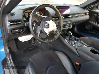 2021 Toyota GR Supra 3.0 with VIN WZ1DB0C09MW036605, listed as a Copart auction lot 86576844 with 31,520 mi miles and Salvage Title. Bid and sale history available at carsss.com. Image 8.