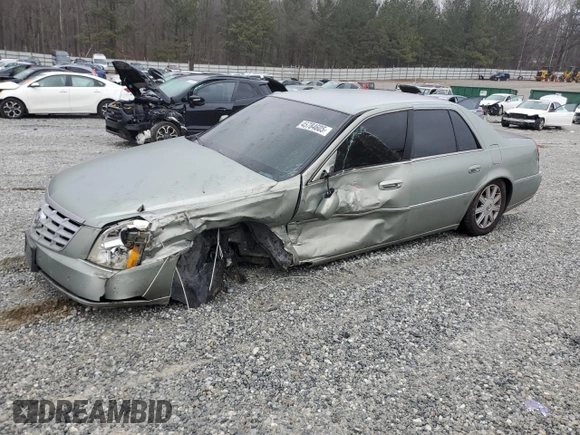 2006 Cadillac DTS 1SD z VIN 1G6KD57YX6U193025, wystawiony jako Copart lot #45784605 z przebiegiem Nie podano mil oraz Szkody całkowita. Historia ofert i sprzedaży dostępna na DreamBid. Obrazek 1.
