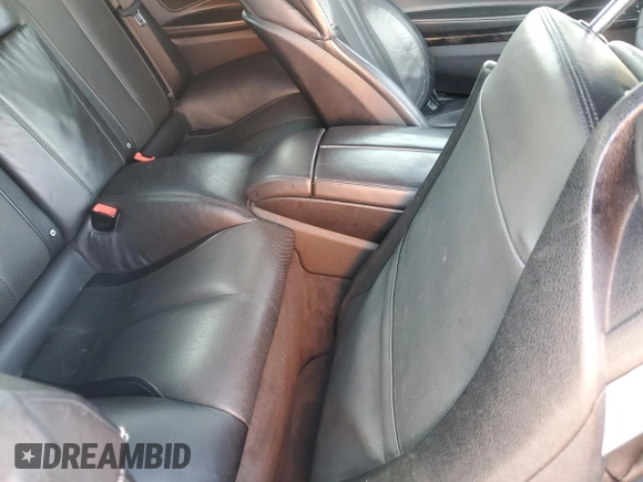 2012 BMW 6 Series 650i z VIN WBALZ3C50CDL70371, wystawiony jako Copart lot #80271534 z przebiegiem 76 332 mil mil oraz Szkody całkowita. Historia ofert i sprzedaży dostępna na DreamBid. Obrazek 10.