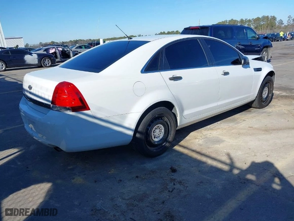 2015 Chevrolet Caprice Police Patrol Vehicle Police with VIN 6G3NS5U30FL132672, listed as a IAAI auction lot 41435425 with 164,928 mi miles. Bid and sale history available at carsss.com. Image 4.