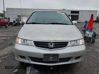 2003 Honda Odyssey EX z VIN 5FNRL18603B008148, wystawiony jako Copart lot #60669825 z przebiegiem 128 115 mil mil oraz Czysty tytuł • Clean title. Historia ofert i sprzedaży dostępna na DreamBid. Obrazek 5.