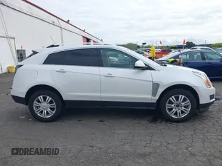 2016 Cadillac SRX Luxury Collection z VIN 3GYFNBE33GS507014, wystawiony jako IAAI lot #41979980 z przebiegiem 115 077 mil mil oraz . Historia ofert i sprzedaży dostępna na DreamBid. Obrazek 14.