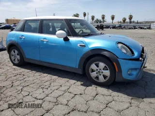 2015 MINI Hardtop 4 Door z VIN WMWXS5C5XFT827473, wystawiony jako Copart lot #58261135 z przebiegiem 75 439 mil mil oraz Szkoda całkowita • Salvage title. Historia ofert i sprzedaży dostępna na DreamBid. Obrazek 4.
