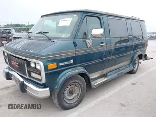 1994 GMC Vandura z VIN 1GDEG25K2RF523677, wystawiony jako IAAI lot #42500077 z przebiegiem 184 965 mil mil oraz . Historia ofert i sprzedaży dostępna na DreamBid. Obrazek 2.