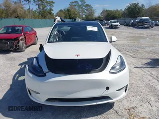 2023 Tesla Model Y Long Range with VIN 7SAYGAEE1PF665934, listed as a IAAI auction lot 41780949 with 21,949 mi miles and . Bid and sale history available at DreamBid. Image 11.