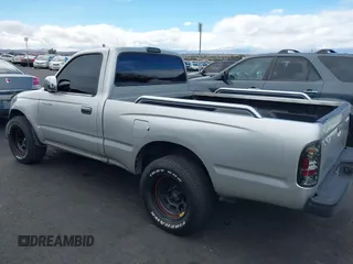 2001 Toyota Tacoma z VIN 5TENL42N81Z813696, wystawiony jako IAAI lot #41799036 z przebiegiem 317 479 mil mil oraz . Historia ofert i sprzedaży dostępna na DreamBid. Obrazek 11.