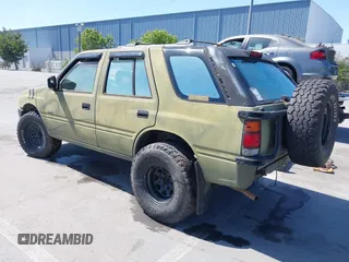 1995 Isuzu Rodeo z VIN 4S2CK58E5S4379419, wystawiony jako IAAI lot #42094055 z przebiegiem 196 175 mil mil oraz . Historia ofert i sprzedaży dostępna na DreamBid. Obrazek 3.