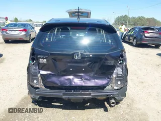 2013 Honda Fit Sport with VIN JHMGE8H59DC001939, listed as a IAAI auction lot 41885102 with 113,639 mi miles. Bid and sale history available at carsss.com. Image 17.