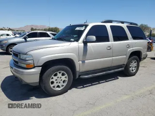 2005 Chevrolet Tahoe Z71 z VIN 1GNEK13T05R187021, wystawiony jako Copart lot #57180025 z przebiegiem 135 572 mil mil oraz Szkoda całkowita • Salvage title. Historia ofert i sprzedaży dostępna na DreamBid. Obrazek 1.