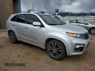 2012 Kia Sorento SX with VIN 5XYKW4A20CG243238, listed as a Copart auction lot 57533915 with 174,954 mi miles and Salvage title. Bid and sale history available at DreamBid. Image 4.
