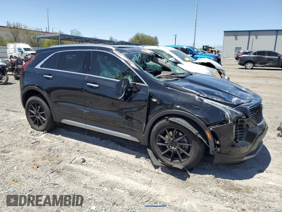 2021 Cadillac XT4 FWD Premium Luxury с VIN 1GYFZCR4XMF004996, выставлен на аукционе Copart как лот 61270355 с пробегом Не указан миль и Списание • Salvage title. История ставок и продаж доступна на DreamBid. Изображение 4.