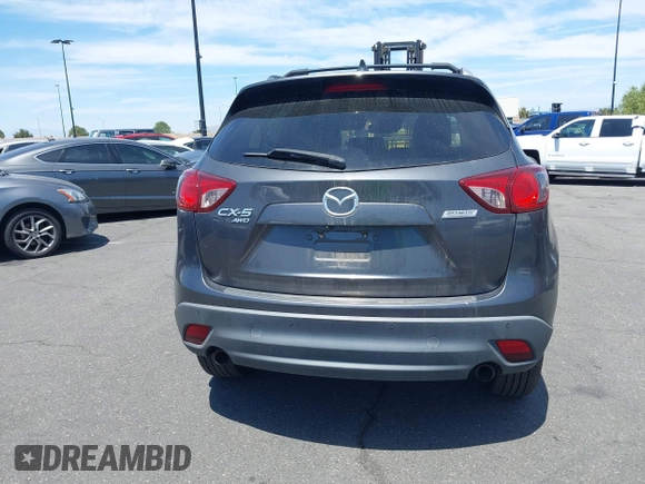 2014 Mazda CX-5 Grand Touring with VIN JM3KE4DY8E0391317, listed as a IAAI auction lot 41871641 with 77,048 mi miles. Bid and sale history available at carsss.com. Image 16.