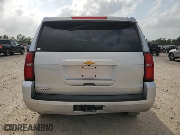 2020 Chevrolet Tahoe LS with VIN 1GNSCAKC9LR265813, listed as a Copart auction lot 51955445 with 63,647 mi miles and Salvage title. Bid and sale history available at DreamBid. Image 6.