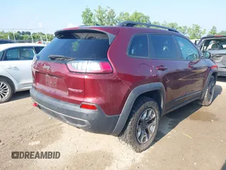 2019 Jeep Cherokee Trailhawk with VIN 1C4PJMBX5KD421043, listed as a IAAI auction lot 42570336 with 114,463 mi miles and . Bid and sale history available at DreamBid. Image 4.