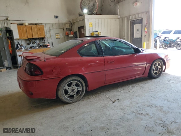2003 Pontiac Grand Am GT with VIN 1G2NW12E43C103139, listed as a Copart auction lot 62676404 with 157,043 mi miles and Clean Title. Bid and sale history available at carsss.com. Image 3.