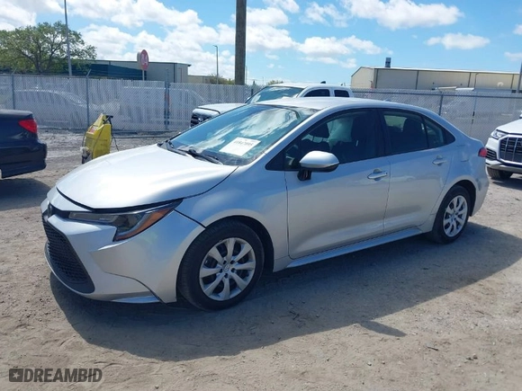 2021 Toyota Corolla LE with VIN JTDEPMAE0MJ119069, listed as a IAAI auction lot 41847095 with 51,561 mi miles. Bid and sale history available at carsss.com. Image 2.