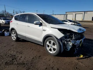 2015 Ford Escape SE with VIN 1FMCU9GX2FUB28617, listed as a Copart auction lot 46711975 with 131,963 mi miles and Salvage Title. Bid and sale history available at DreamBid. Image 4.