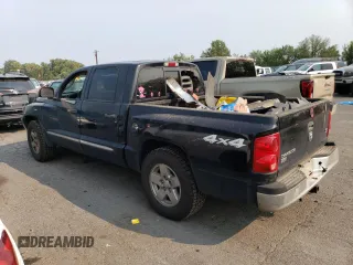 2005 Dodge Dakota Laramie with VIN 1D7HW58N65S161629, listed as a Copart auction lot 66570164 with 205,984 mi miles and Salvage Title. Bid and sale history available at carsss.com. Image 2.