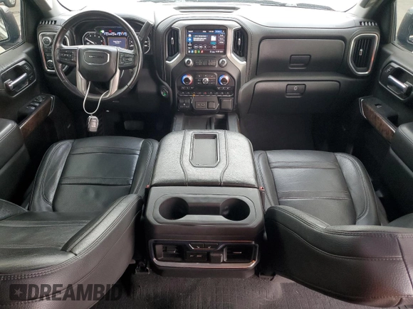 2020 GMC Sierra 1500 Denali z VIN 3GTU9FET7LG441170, wystawiony jako Copart lot #77635974 z przebiegiem 65 028 mil mil oraz Czysty tytuł • Clean title. Historia ofert i sprzedaży dostępna na DreamBid. Obrazek 8.