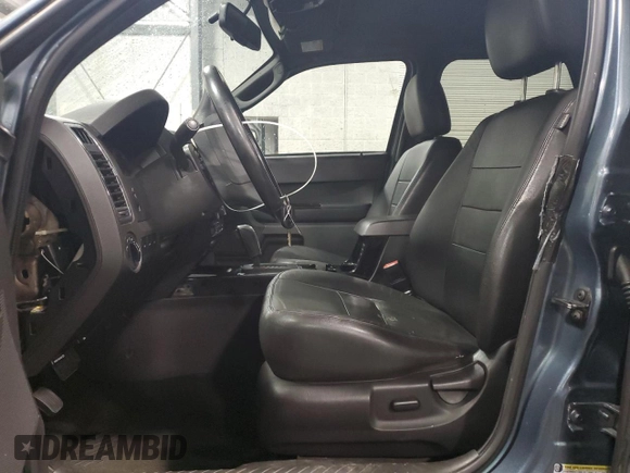 2010 Ford Escape Limited with VIN 1FMCU0EG8AKA54266, listed as a Copart auction lot 59367135 with 123,598 mi miles and Salvage title. Bid and sale history available at DreamBid. Image 7.