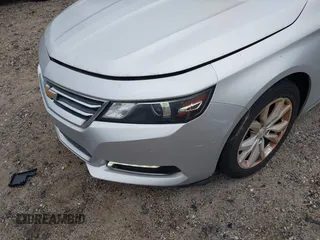 2018 Chevrolet Impala LT with VIN 1G1105S39JU135456, listed as a IAAI auction lot 42360696 with 124,176 mi miles and . Bid and sale history available at DreamBid. Image 10.