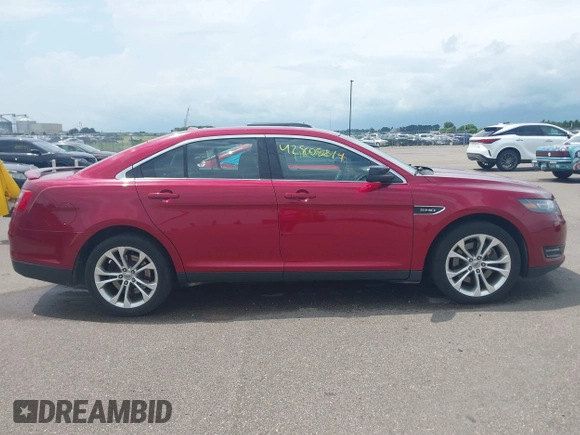 2014 Ford Taurus SHO with VIN 1FAHP2KT1EG133940, listed as a IAAI auction lot 42805214 with 141,204 mi miles and . Bid and sale history available at DreamBid. Image 13.