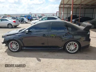 2015 Mitsubishi Lancer Evolution GSR z VIN JA32W8FV2FU020047, wystawiony jako IAAI lot #41890897 z przebiegiem 121 089 mil mil oraz . Historia ofert i sprzedaży dostępna na DreamBid. Obrazek 15.