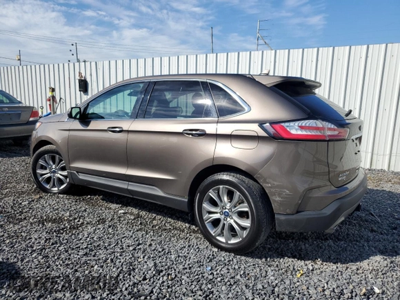 2019 Ford Edge Titanium with VIN 2FMPK4K99KBC31259, listed as a Copart auction lot 63067555 with 86,629 mi miles and Salvage title. Bid and sale history available at DreamBid. Image 2.