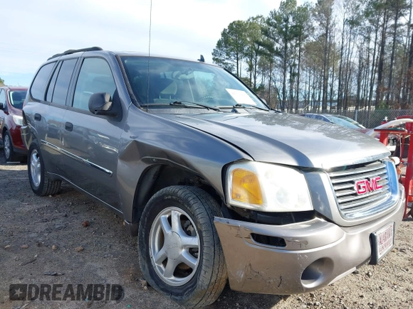2007 GMC Envoy SLE with VIN 1GKDS13S372241844, listed as a IAAI auction lot 41575443 with 144,726 mi miles. Bid and sale history available at carsss.com. Image 1.