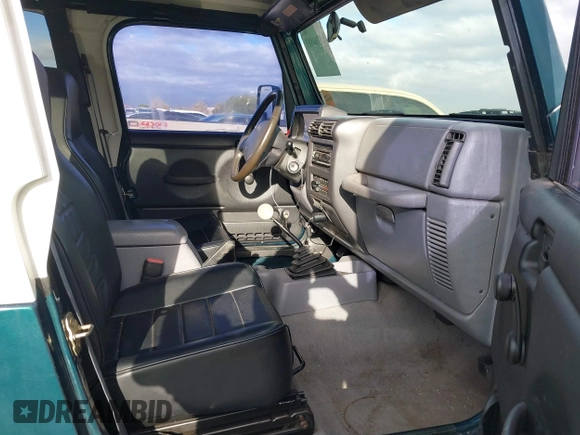 1998 Jeep Wrangler Sport with VIN 1J4FY19S7WP787679, listed as a IAAI auction lot 41764883 with 134,144 mi miles. Bid and sale history available at carsss.com. Image 5.