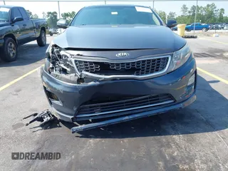 2015 Kia Optima EX z VIN KNAGN4AD8F5084764, wystawiony jako IAAI lot #42404405 z przebiegiem 158 587 mil mil oraz . Historia ofert i sprzedaży dostępna na DreamBid. Obrazek 6.
