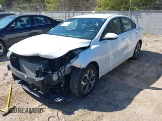 2021 Kia Forte LXS with VIN 3KPF24AD3ME396967, listed as a IAAI auction lot 41870838 with 10,046 mi miles and . Bid and sale history available at carsss.com. Image 2.