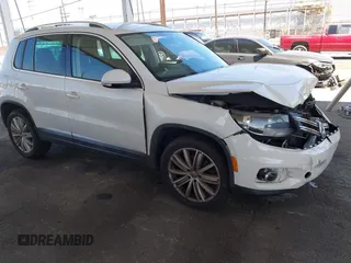 2013 Volkswagen Tiguan SE with VIN WVGAV7AX9DW514874, listed as a IAAI auction lot 42686433 with 101,782 mi miles and . Bid and sale history available at DreamBid. Image 1.