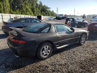 1999 Mitsubishi 3000GT z VIN JA3AM44HXXY002638, wystawiony jako Copart lot #67132454 z przebiegiem 181 684 mil mil oraz Tytuł czysty. Historia ofert i sprzedaży dostępna na DreamBid. Obrazek 3.