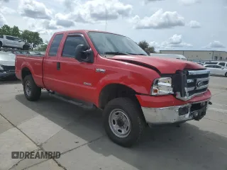 2005 Ford F-250 XL with VIN 1FTSX21P15EA76932, listed as a Copart auction lot 52053355 with 134,955 mi miles and Salvage title. Bid and sale history available at DreamBid. Image 4.