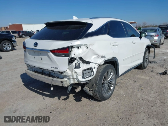 2020 Lexus RX with VIN 2T2JZMAA5LC165525, listed as a IAAI auction lot 41396533 with 67,440 mi miles. Bid and sale history available at carsss.com. Image 4.