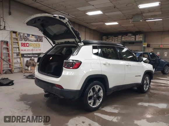 2021 Jeep Compass Limited with VIN 3C4NJCCB0MT576990, listed as a IAAI auction lot 41710809 with 77,903 mi miles. Bid and sale history available at carsss.com. Image 4.