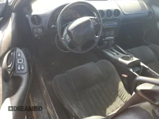 2001 Pontiac Firebird Firebird с VIN 2G2FS22K512146722, выставлен на аукционе Copart как лот 71178444 с пробегом 171 387 миль миль и Списание • Salvage title. История ставок и продаж доступна на DreamBid. Изображение 8.