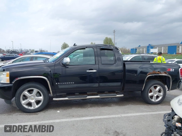2009 Chevrolet Silverado 1500 LT with VIN 1GCEK29079Z199152, listed as a IAAI auction lot 41934658 with 129,864 mi miles. Bid and sale history available at carsss.com. Image 14.