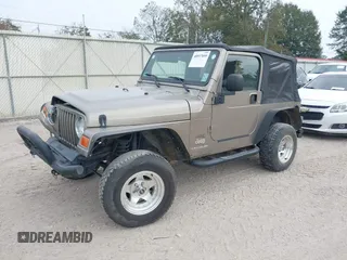 2003 Jeep Wrangler SE with VIN 1J4FA29113P304250, listed as a IAAI auction lot 40917099 with 191,589 mi miles. Bid and sale history available at carsss.com. Image 2.