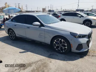 2024 BMW i5 eDrive40 with VIN WBY33FK09RCR17369, listed as a Copart auction lot 65018825 with 3,853 mi miles and Clean title. Bid and sale history available at DreamBid. Image 4.